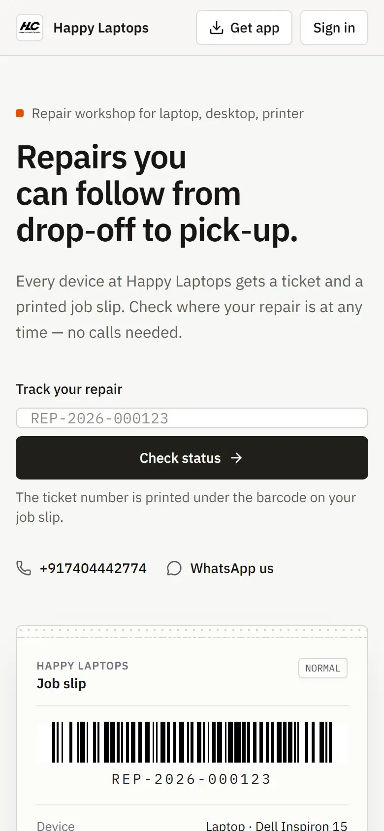 Happy Laptops repair tracker website home page on a phone